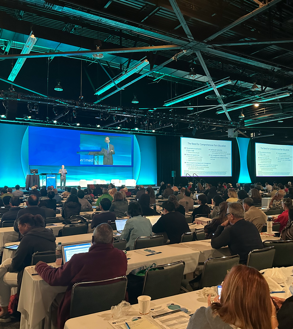 A professional education conference pictured in the 2027 prospectus