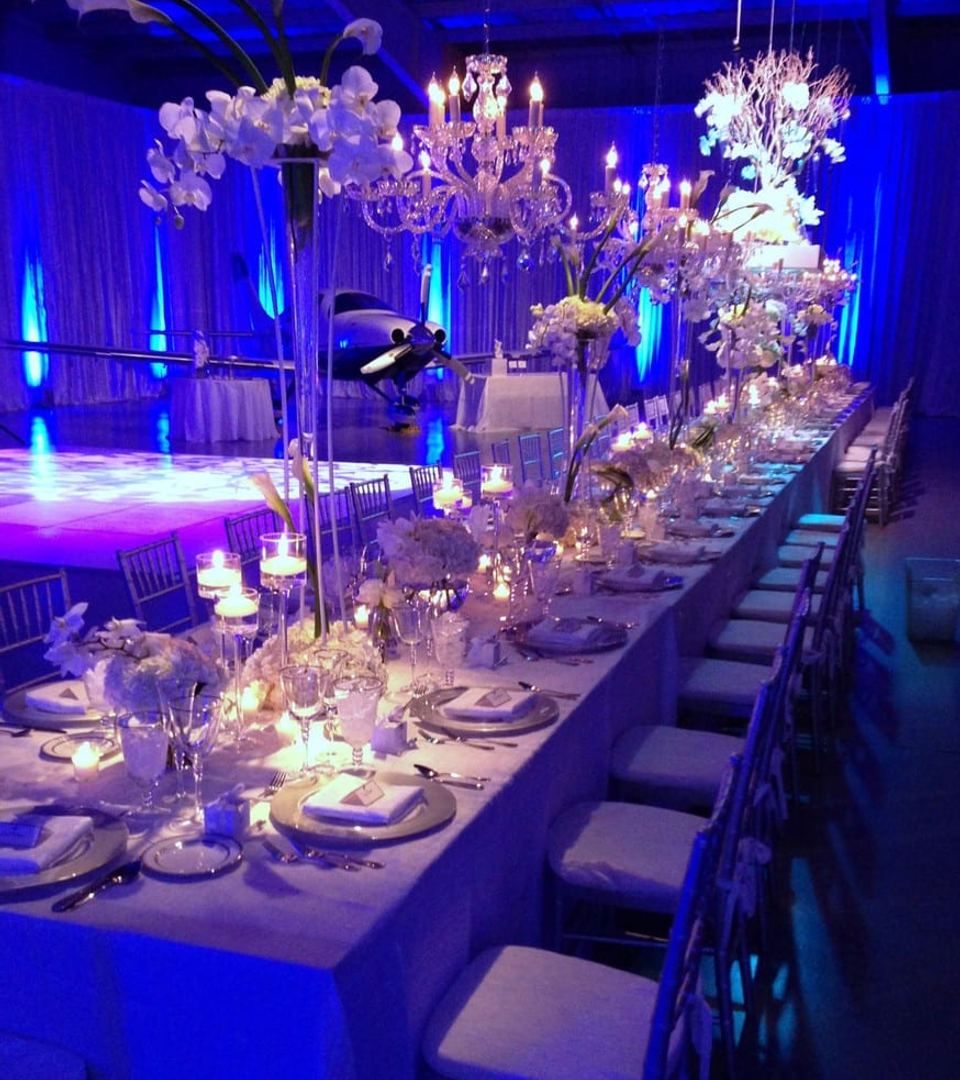 A hangar dressed for an evening gala, as featured in the 2027 prospectus